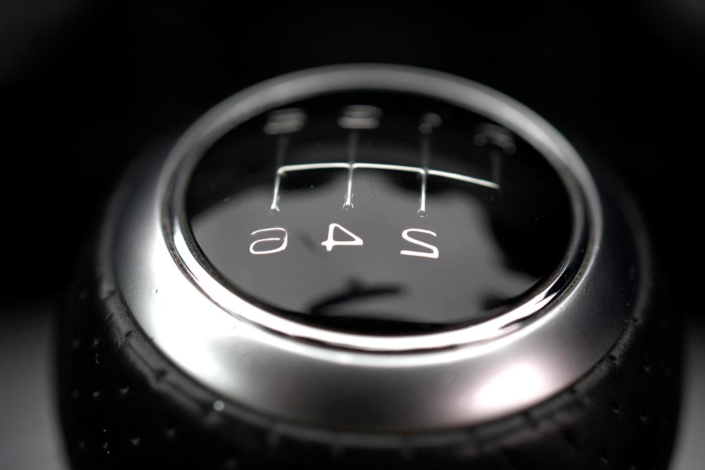 Professional traveler with organized briefcase and luggage in airport lounge