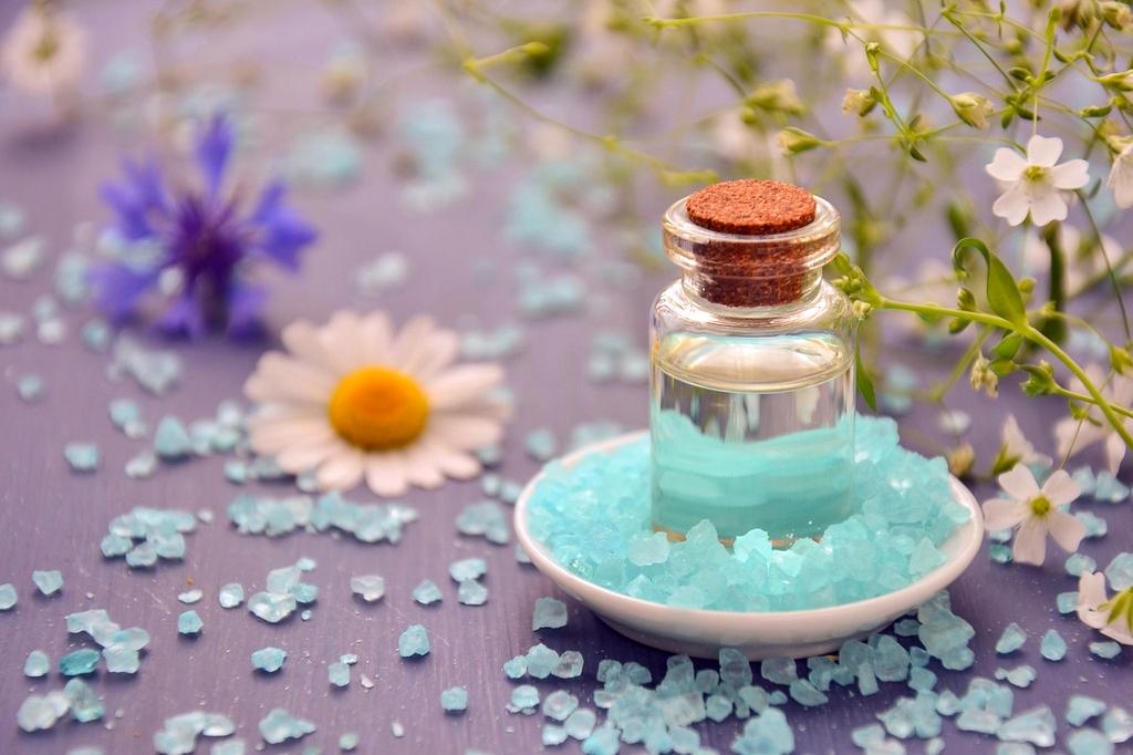 Traveler smiling while packing luggage