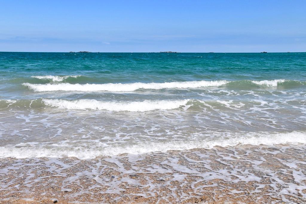 Happy family traveling together with suitcases