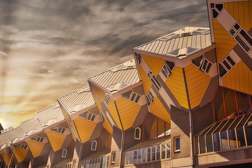 Neatly packed colorful casual outfits with packing cubes