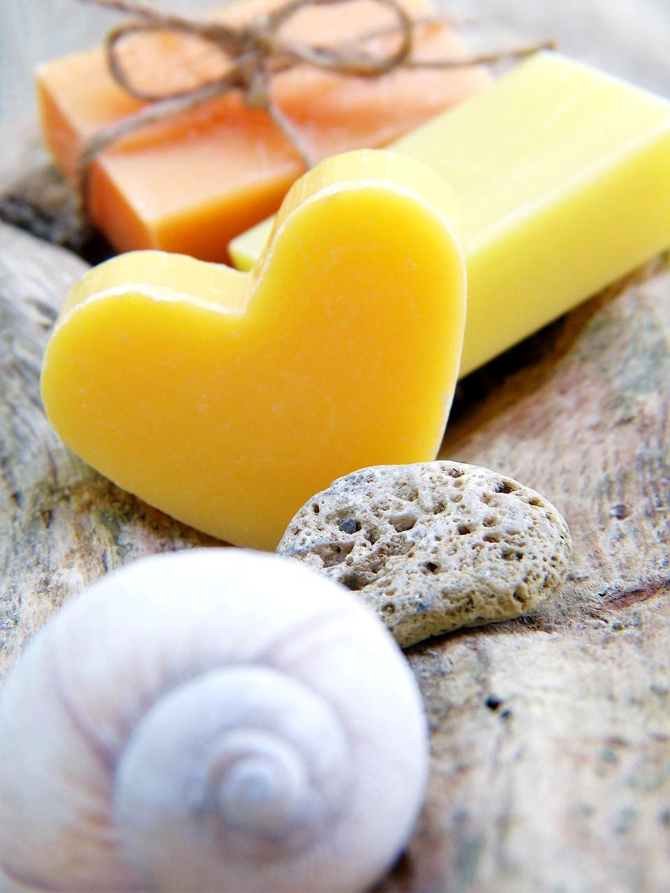 Lightweight duffel bag with travel essentials including sunglasses and hat